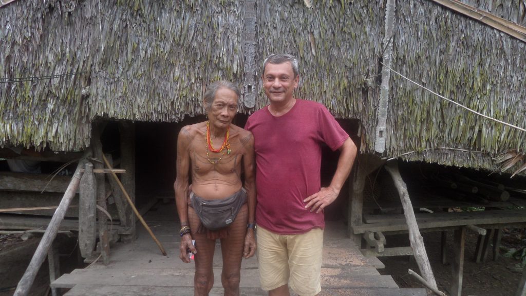 Shaman and me in front of his home