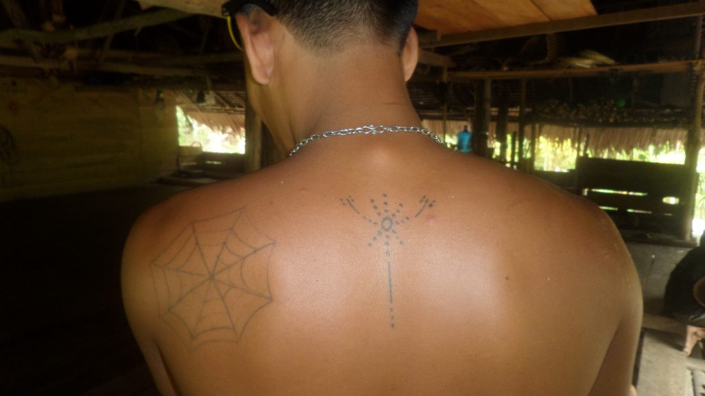 Tattoo on a young Mentawai boy