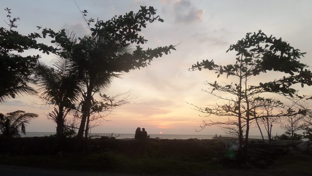 Watching the sunset in Padang